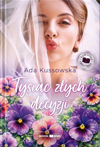 Tysiąc złych decyzji. Duże Litery, Ada Kussowska
